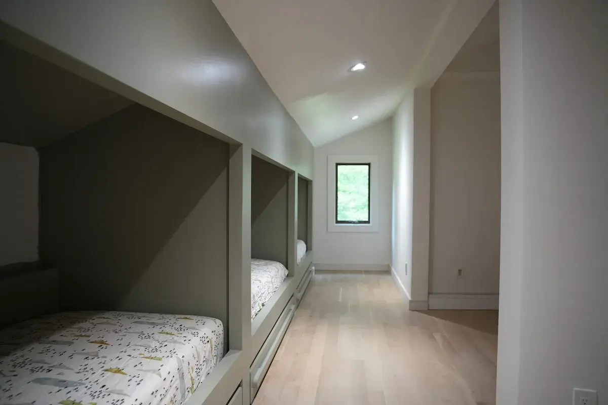 Bedroom 5, single beds built into the walls
