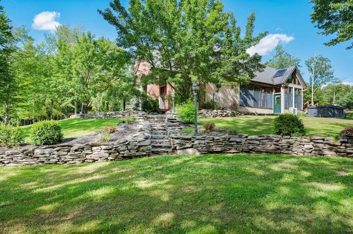 Stone walls terracing the lawn