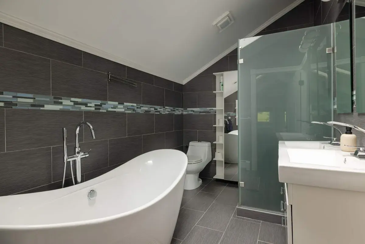 A bathroom with a freestanding tub