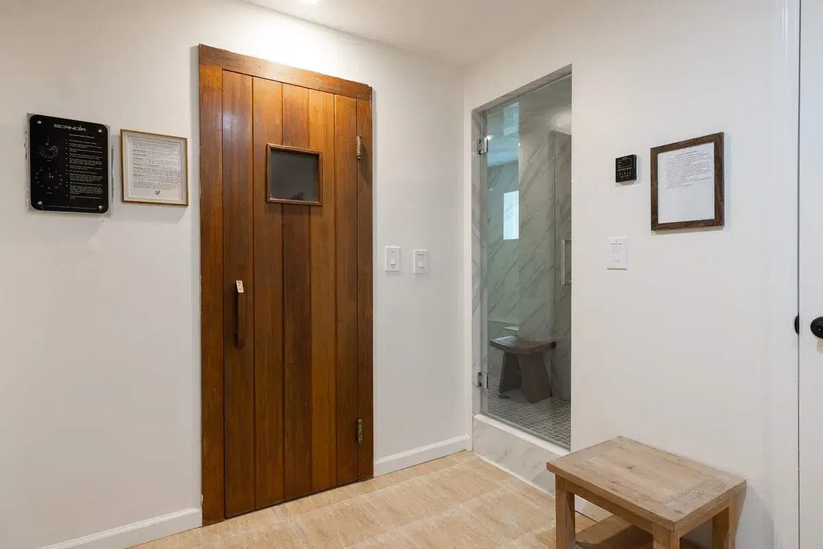 The sauna door and the steam room